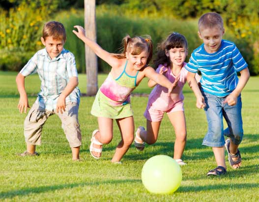 A group of children having fun and playing sports